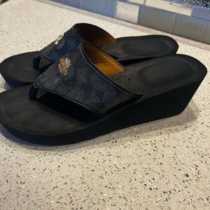 Coach Black Wedge Shoes with Decorative Emblem
